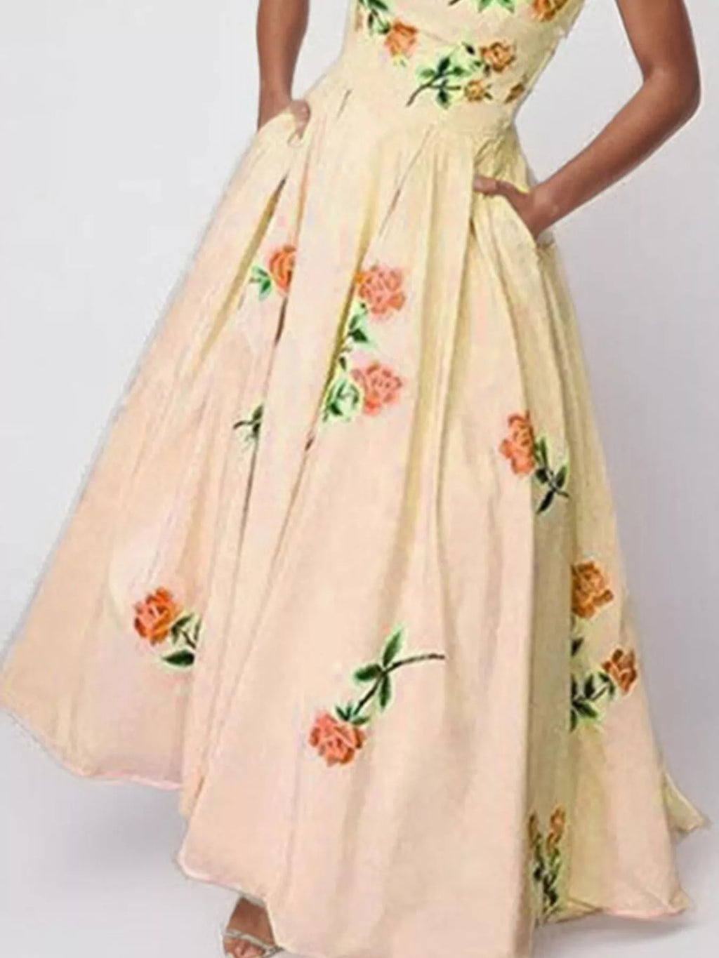 Floral print tube maxi dress from Trendsi featuring a fitted bodice, flowing skirt, and vibrant floral pattern.