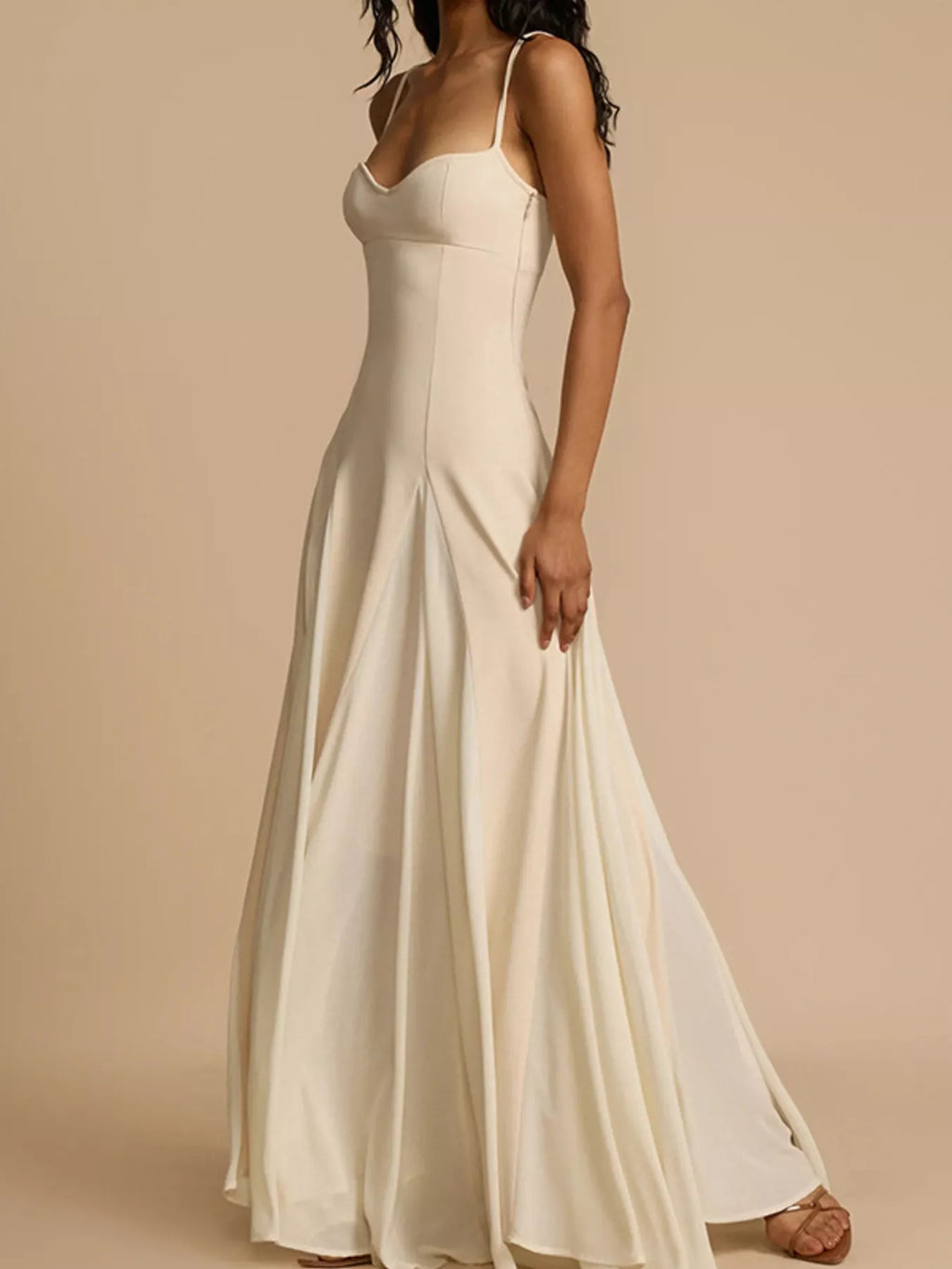Flowy sweetheart neck spaghetti strap maxi dress by Trendsi, featuring a breezy silhouette and elegant design.