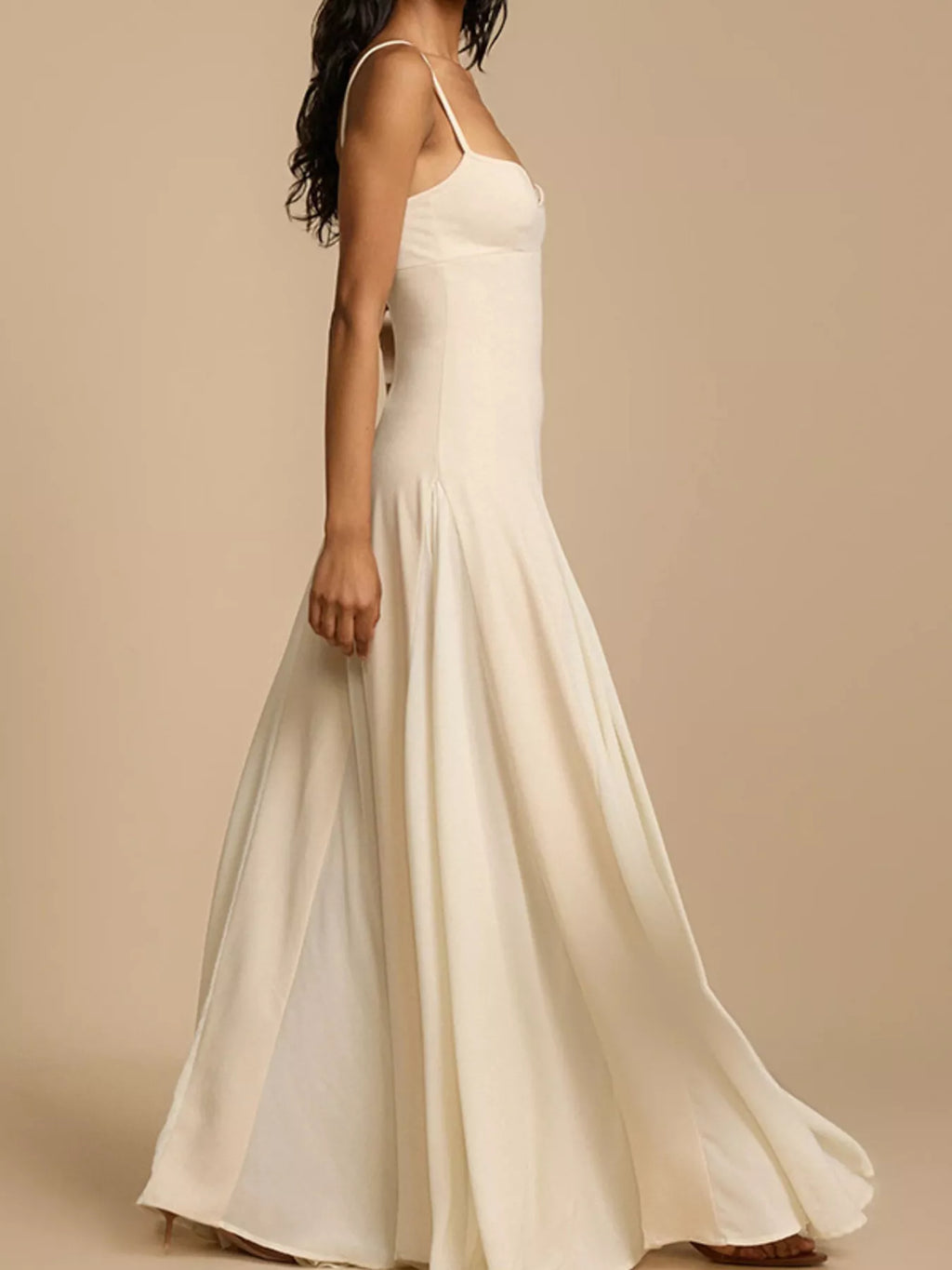 Flowy sweetheart neck maxi dress with spaghetti straps by Trendsi, featuring a soft, flowing fabric ideal for warm-weather occasions.