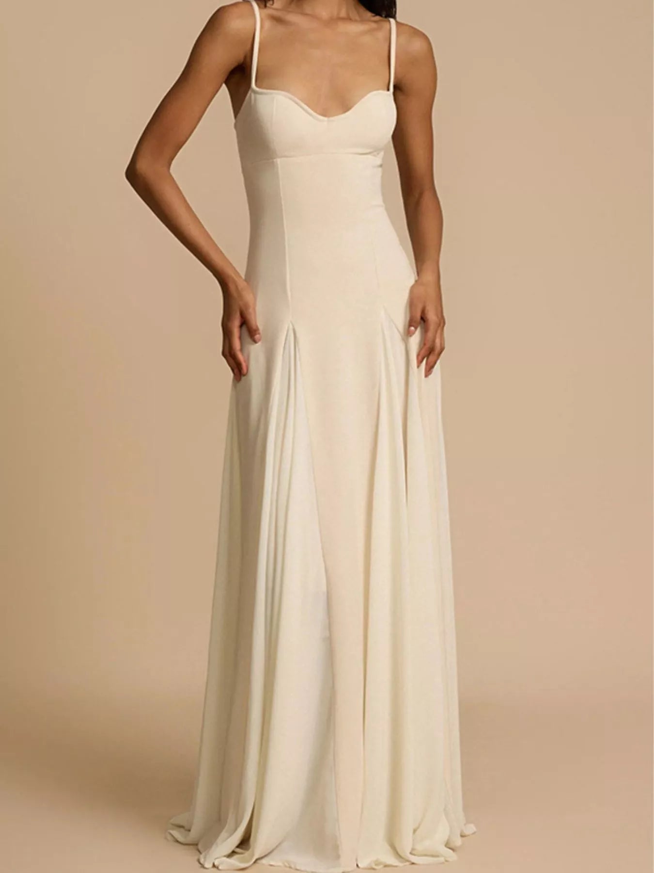Flowy sweetheart neckline maxi dress with spaghetti straps from Trendsi, perfect for elegant summer occasions.