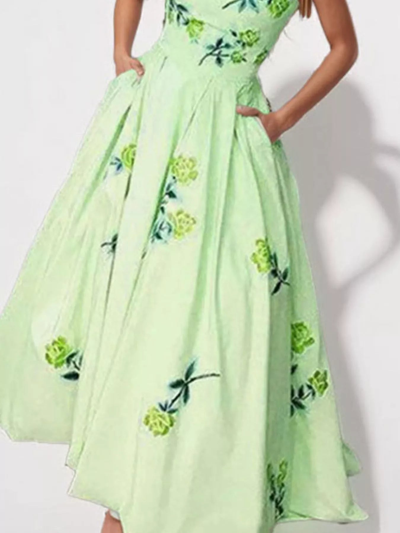 Floral print tube maxi dress from Trendsi featuring a fitted bodice, flowing skirt, and vibrant floral pattern.